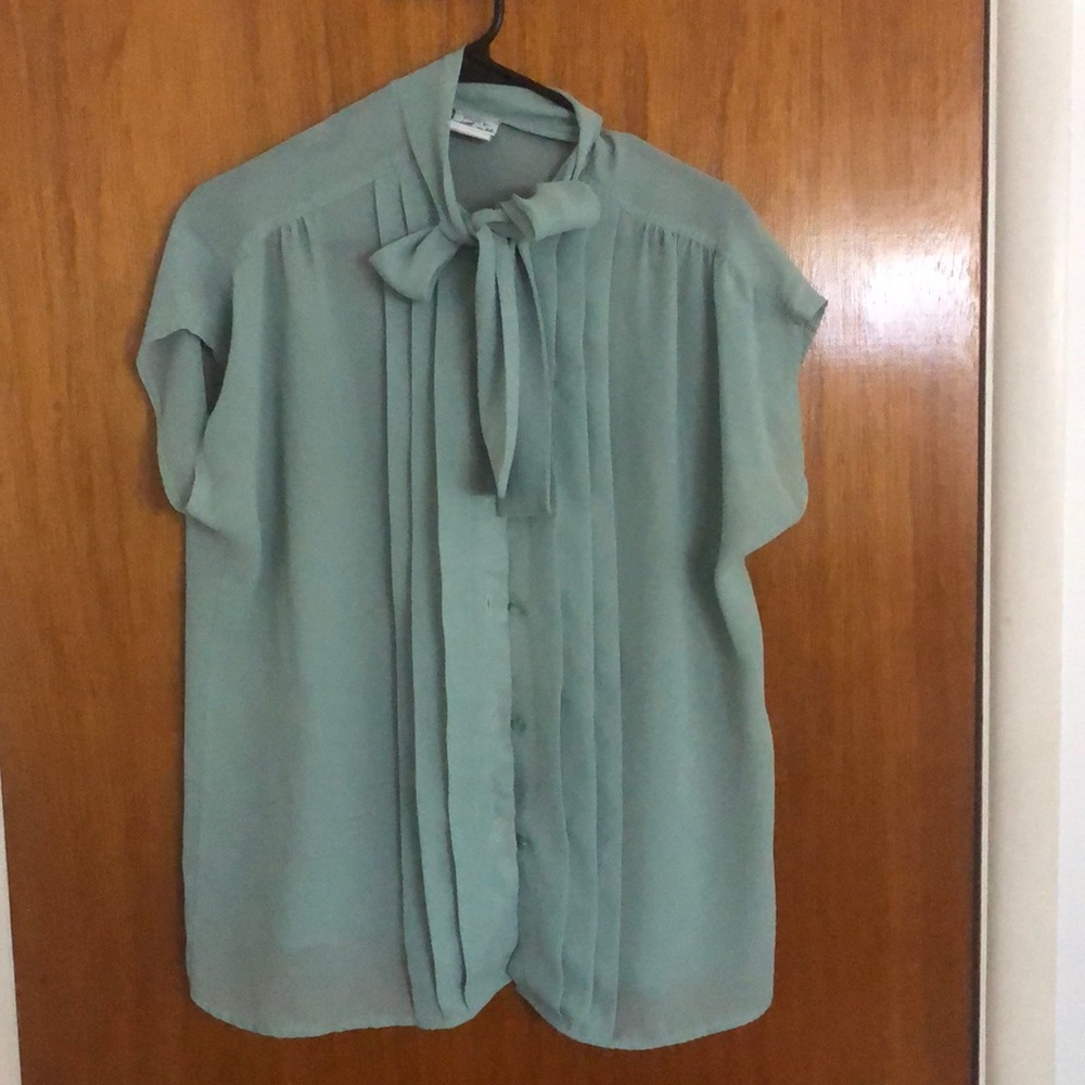 light sea-foam green blouse